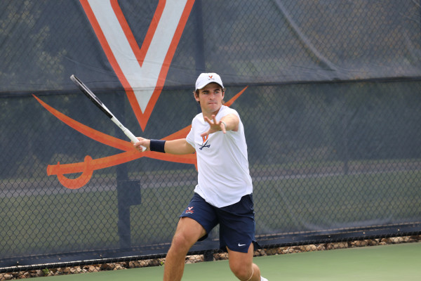 UVA Data Science student James Hopper playing tennis for UVA